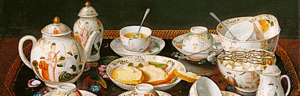 tea tray showing cups, plates, teapot, spoons, crusts of bread